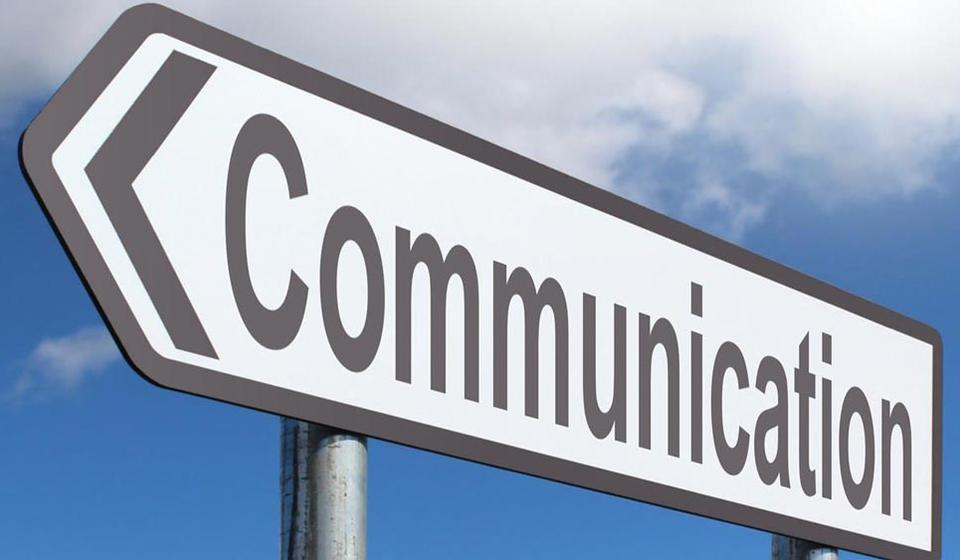 "communication" on a sign